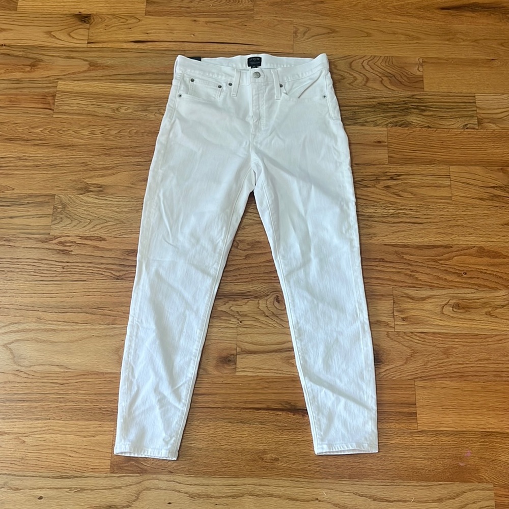 I am selling white 9” high-rise skinny jeans! They are J.Crew and a size 30!